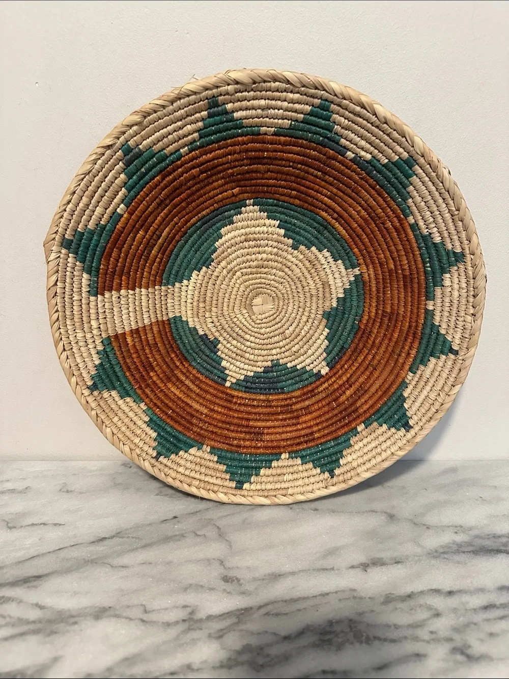 Vintage African Handwoven Decorative Wall Basket in Natural, Teal, and Brown